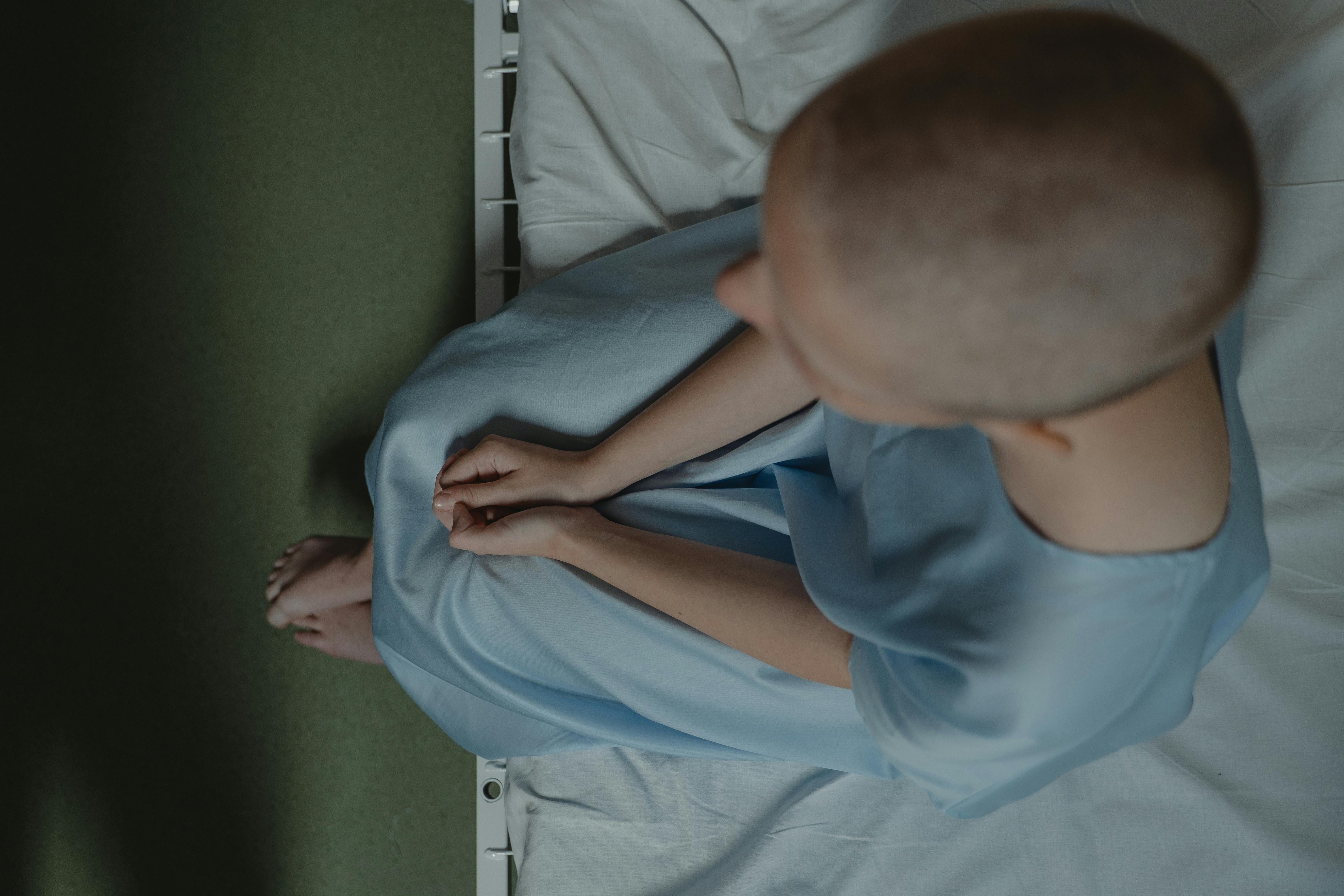 person in bed