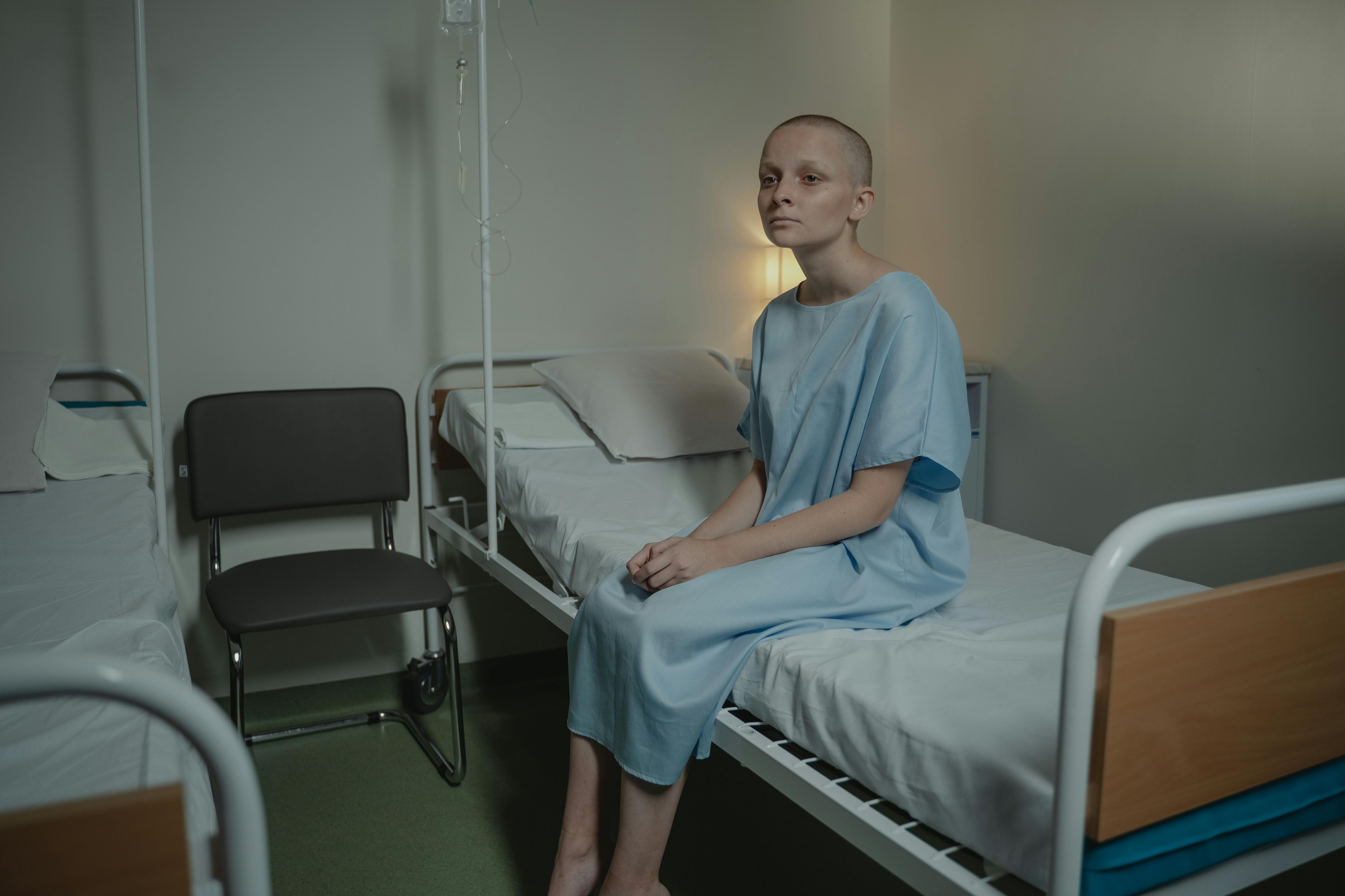 Person siting on a bed